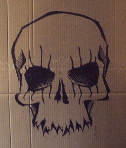 skull drawn in pen on coffin for alice cooper performance