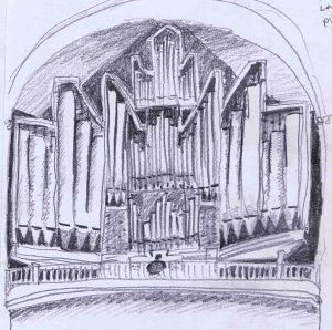 dwarfed organist playing at saint marien cathedral